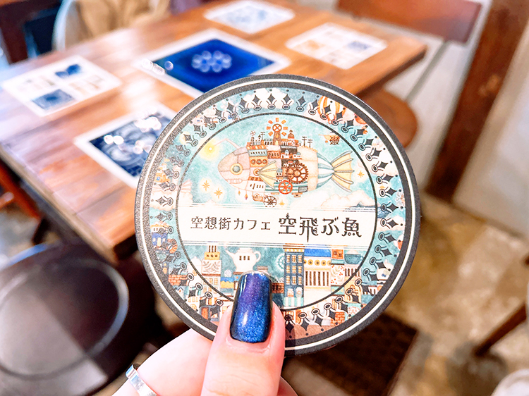 「空想街カフェ 空飛ぶ魚」オープン記念絵柄コースター