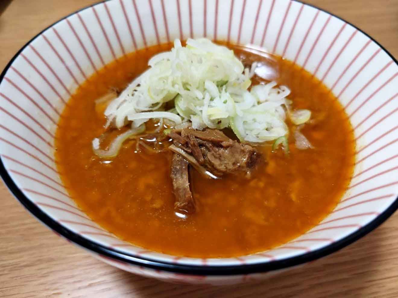 「七厘いちわ 豪徳寺店」のもつ煮