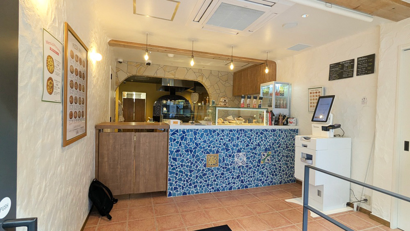 「ピッツェリア トニーノ 梅ヶ丘店」の店内